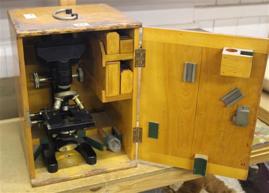 Cased microscope fitted with lenses, etc
